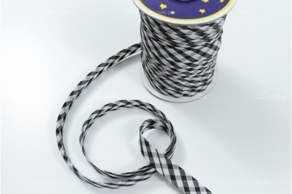 Коса бейка чорно-біла клітинка