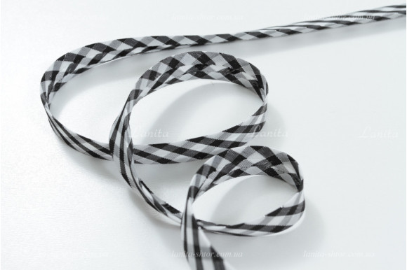 Коса бейка чорно-біла клітинка