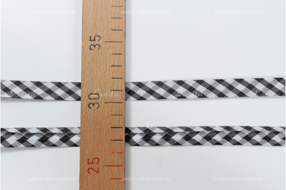 Коса бейка чорно-біла клітинка